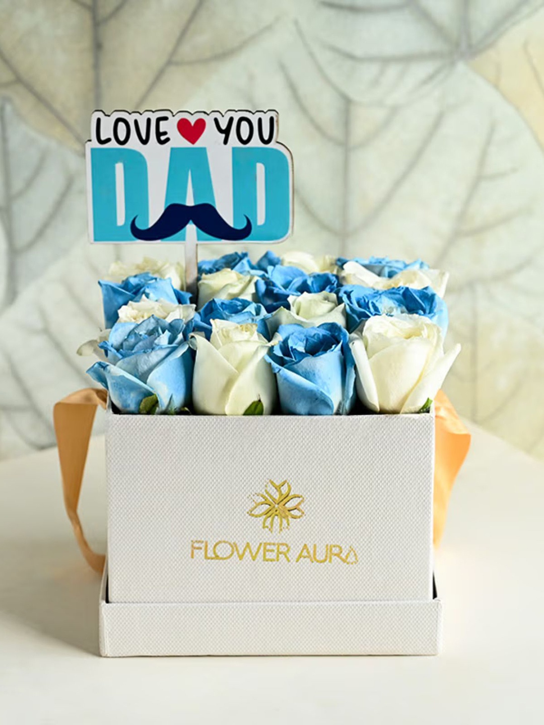 

Floweraura White & Blue 16 PIeces Rose Flowers Bouquet With Topper