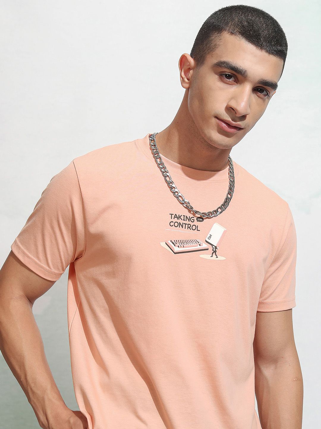 

HIGHLANDER Men Typography Printed Round Neck T-shirt, Coral