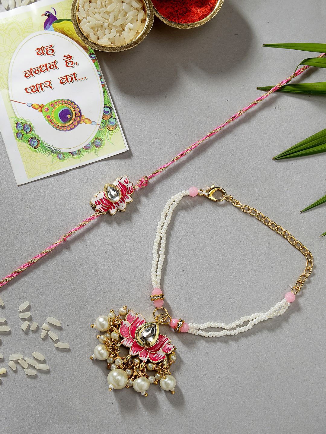 

NVR Set of 2 Lotus Stone-Studded & Beaded Bhaiya Bhabhi Rakhi with Roli Chawal, Pink