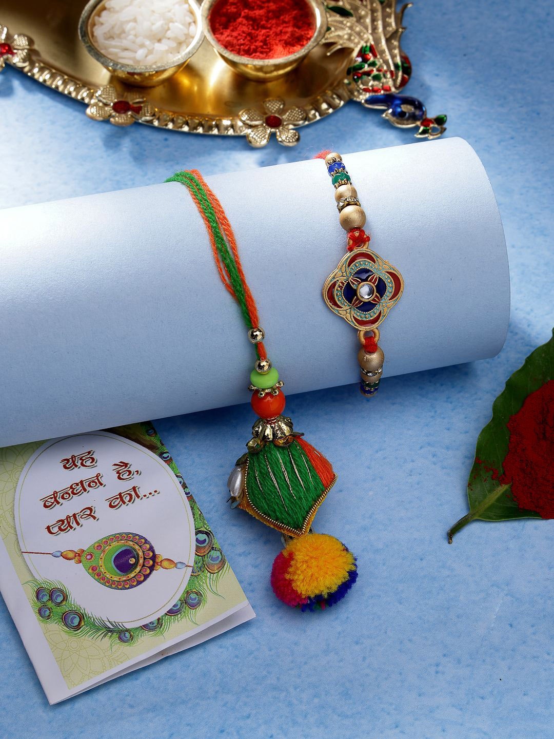 

NVR Set of 2 Beaded Thread Rakhis With Roli Chawal, Green