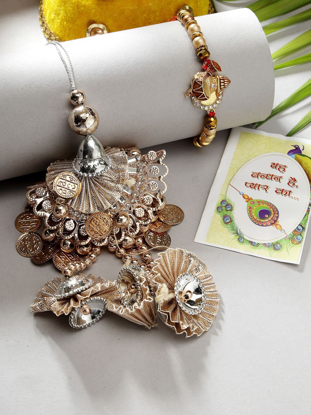 

NVR Set of 2 Beaded Thread Rakhis With Roli Chawal, Gold