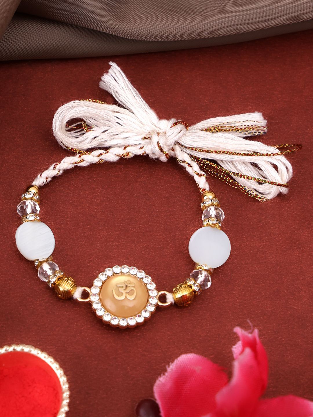 

PANASH Gold Plated Om Shaped Beaded With Stone Studded Thread Rakhi With Roli Chawal, White