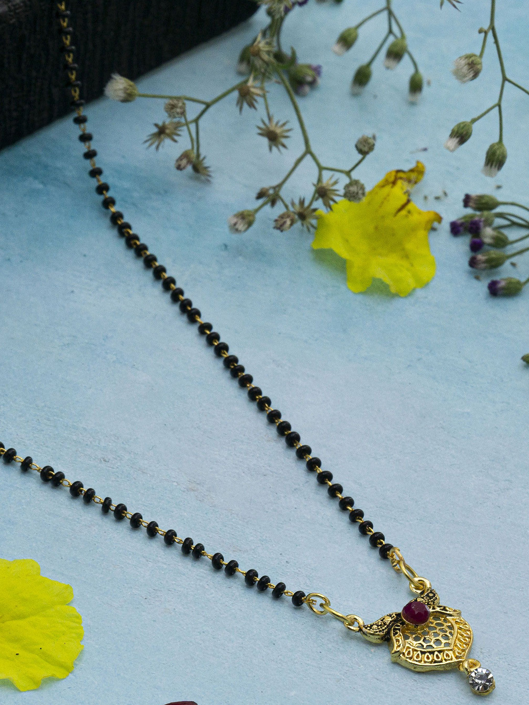 

Ramdev Art Fashion Jwellery Gold Plated Artificial Stones and Beads Mangalsutra