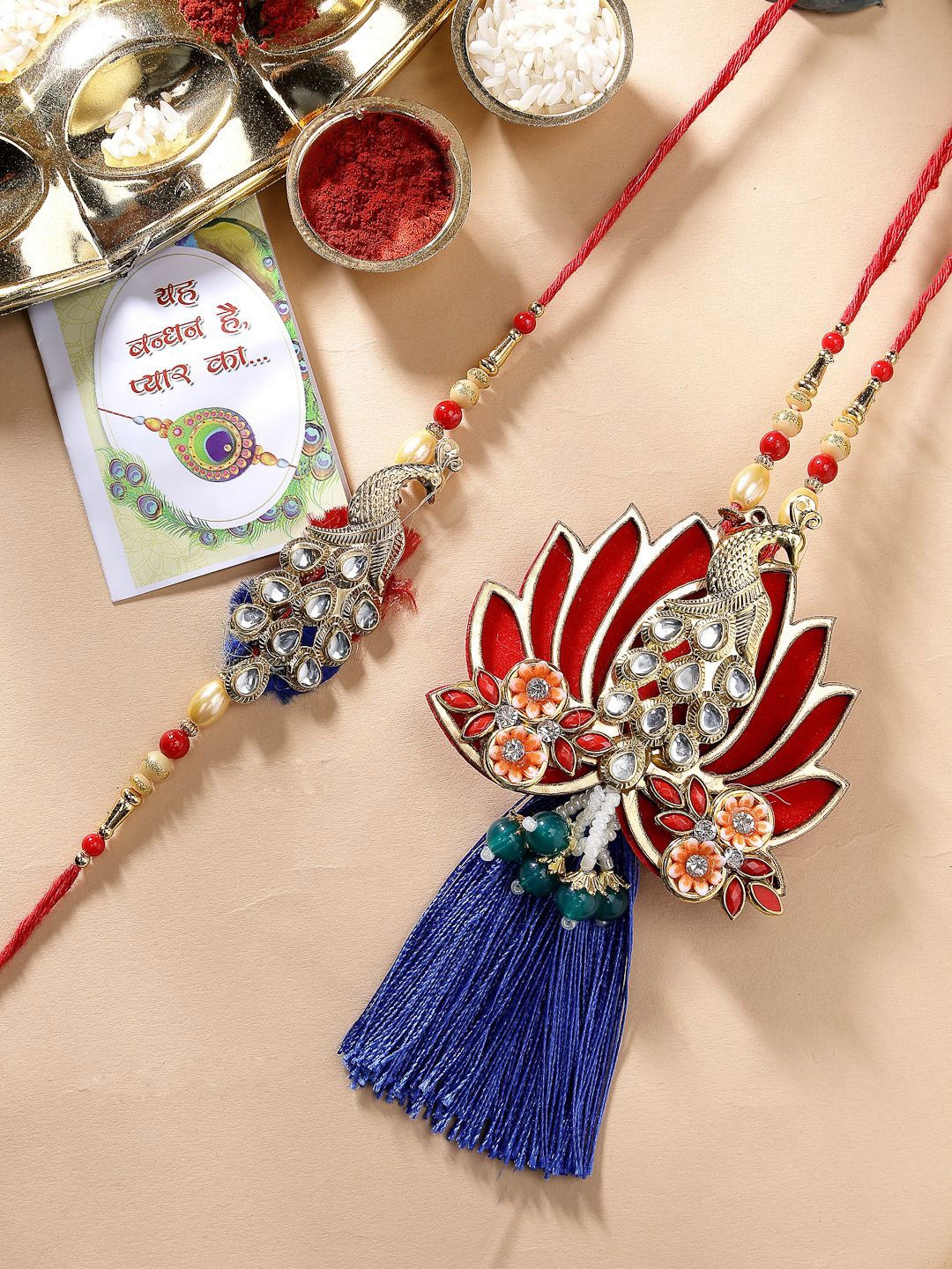 

NVR Peacock Design Bhaiya Bhabhi Rakhi with Roli Chawal & Chocolate, Red