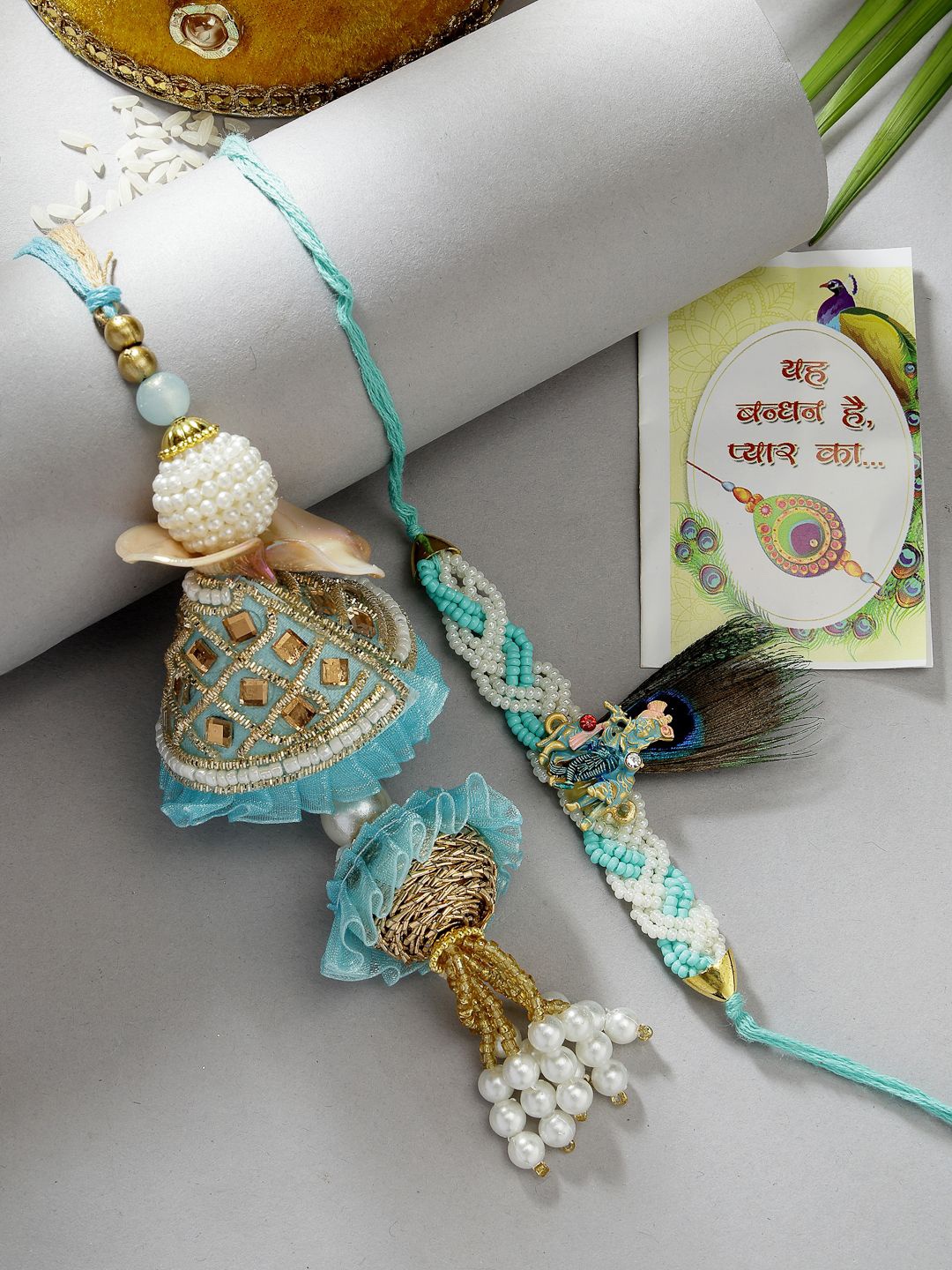 

NVR Set of 2 Pearl Beaded Bhaiya Bhabhi Rakhi with Roli Chawal & Chocolate, Blue