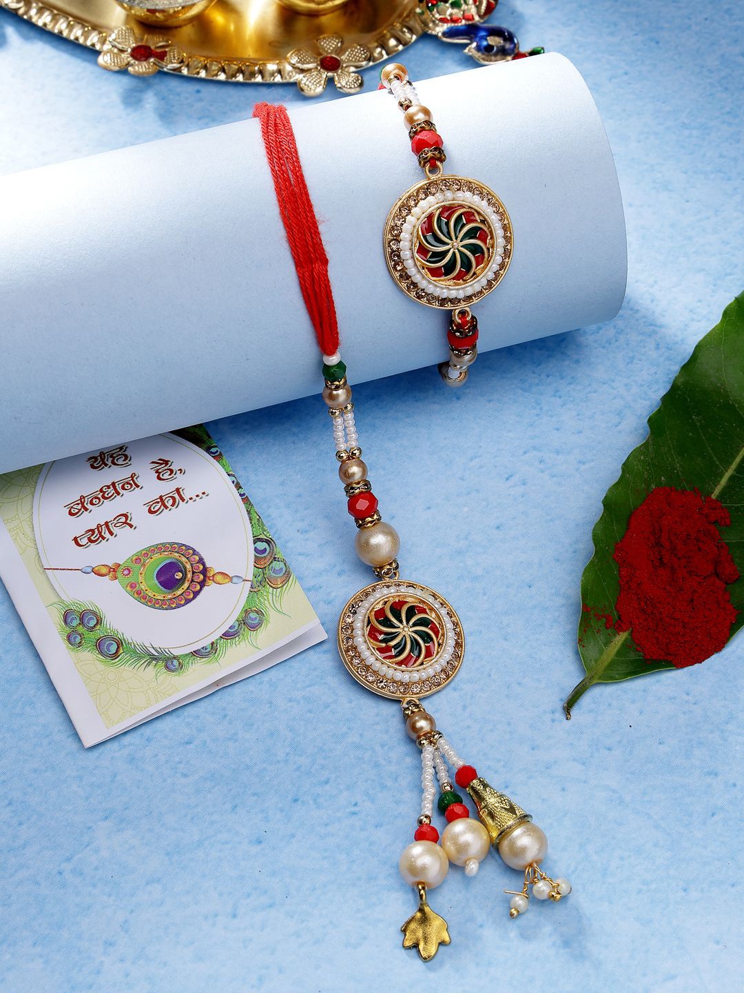 

NVR Set of 2 Stone-Studded & Beaded Bhaiya Bhabhi Rakhi with Roli Chawal & Chocolate, Gold
