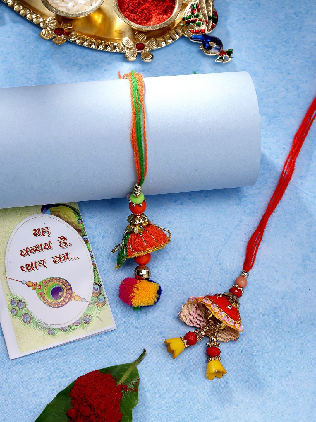 

NVR Beaded Lumba Rakhis With Roli Chawal & Chocolate, Red