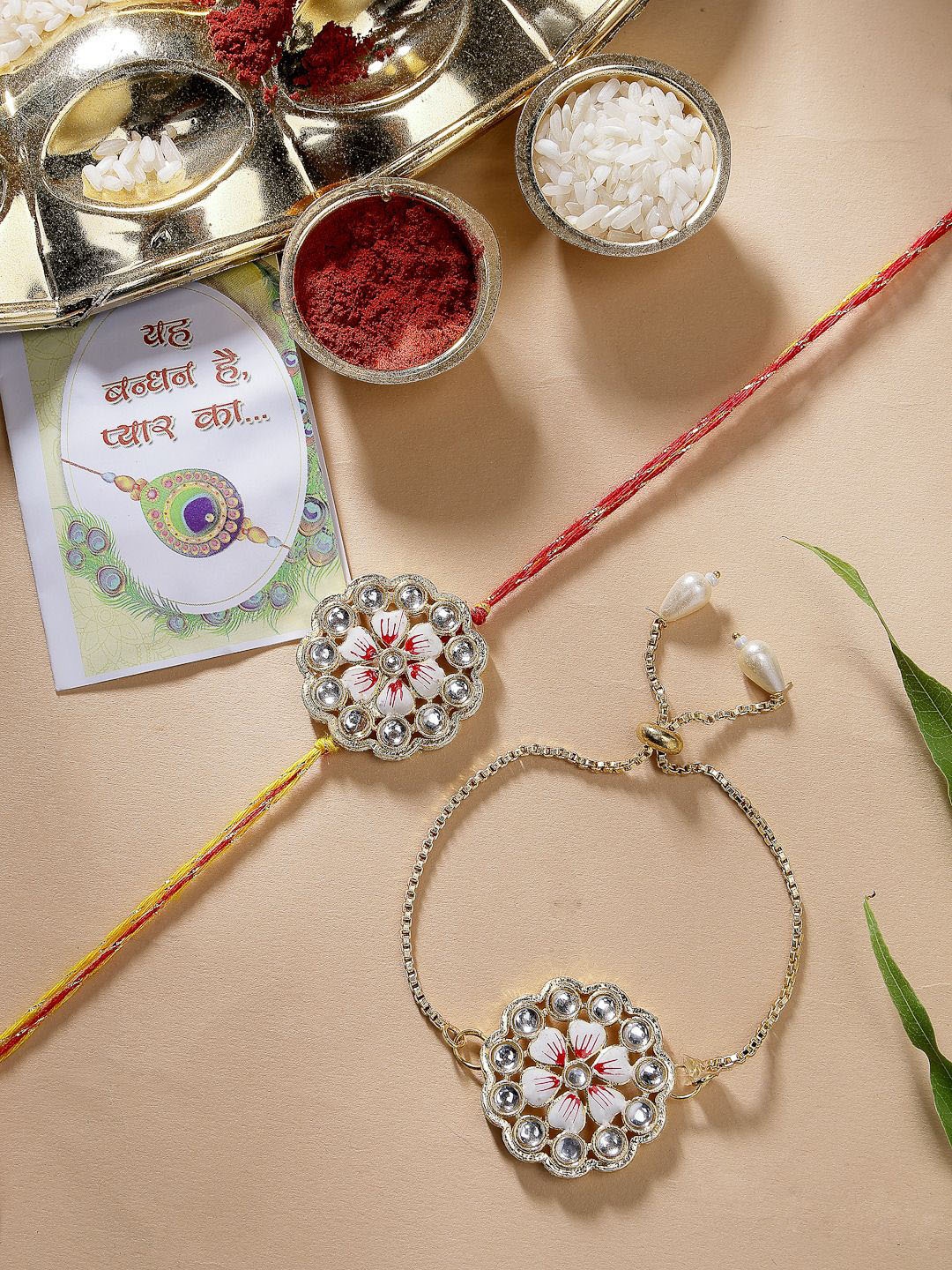 

NVR Set of 2 Kundan-Studded & Beaded Bhaiya Bhabhi Rakhi with Roli Chawal & Chocolate, Gold