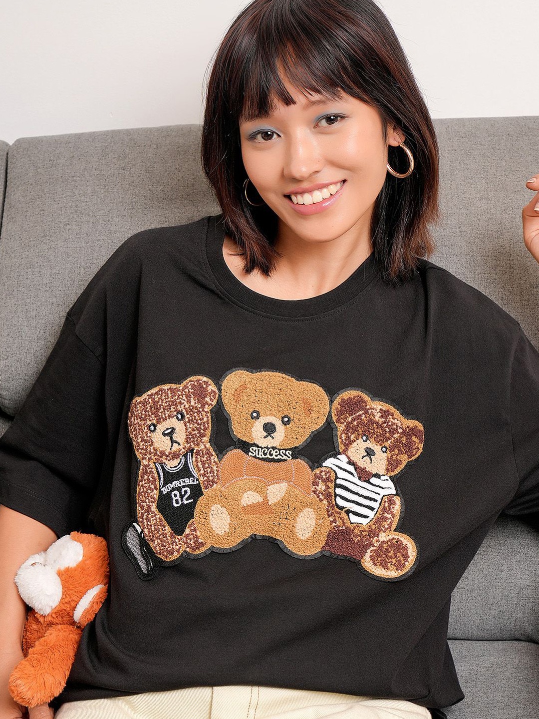 

Tokyo Talkies Women Printed Embroidered Round Neck T-shirt, Black