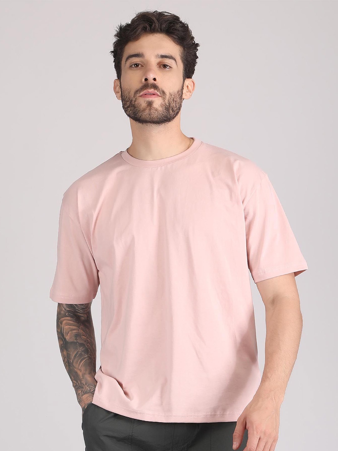 

Raxedo Men Solid Round Neck T-shirt, Peach