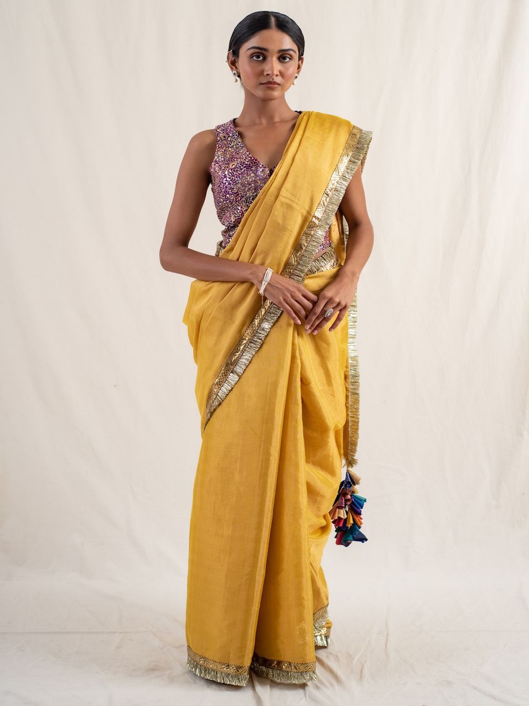 

PriyankaRaajiv Solid Embellished Pure Silk Saree, Yellow