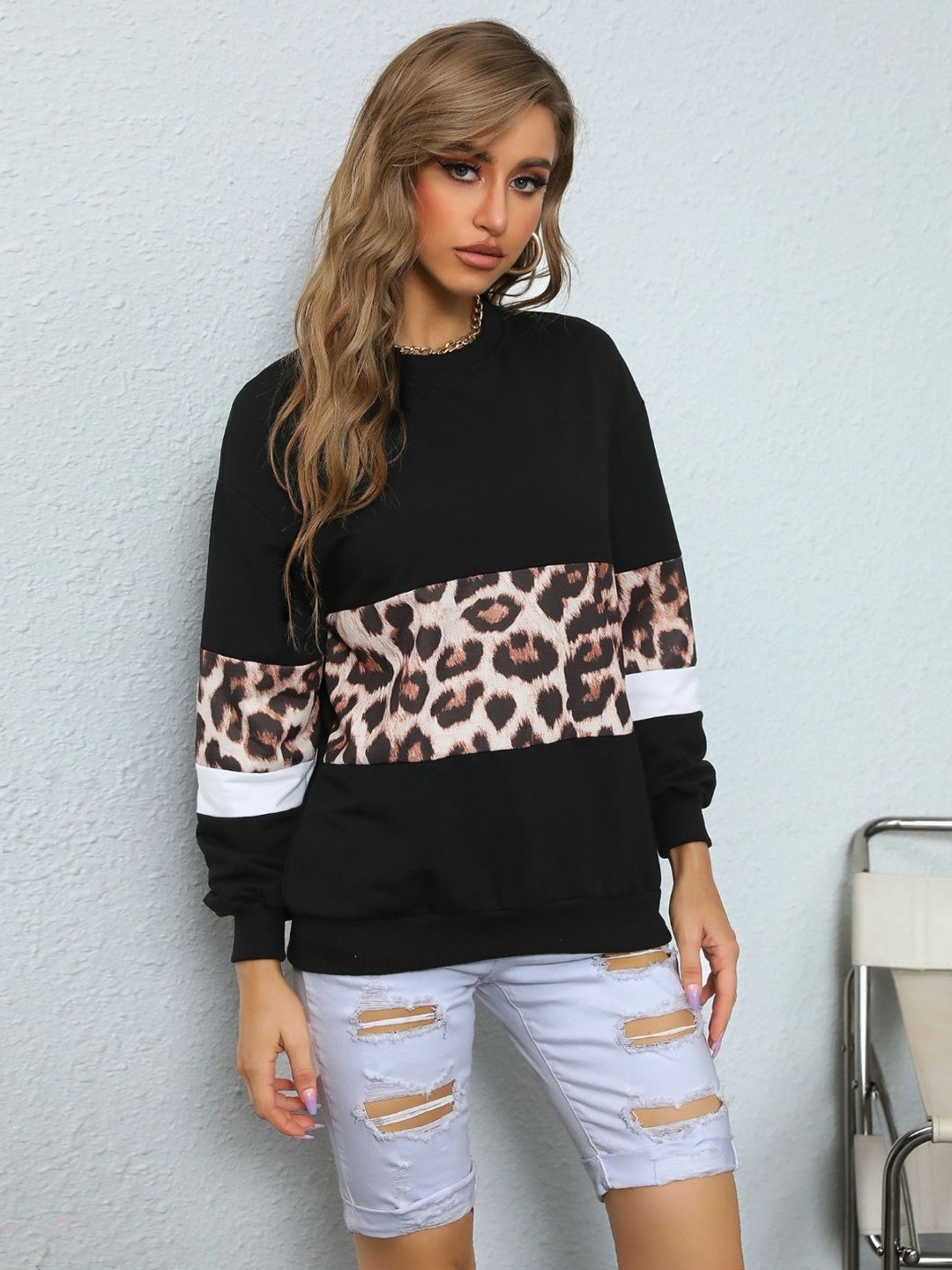 

StyleCast Women Animal Skin Printed Sweatshirt, Black