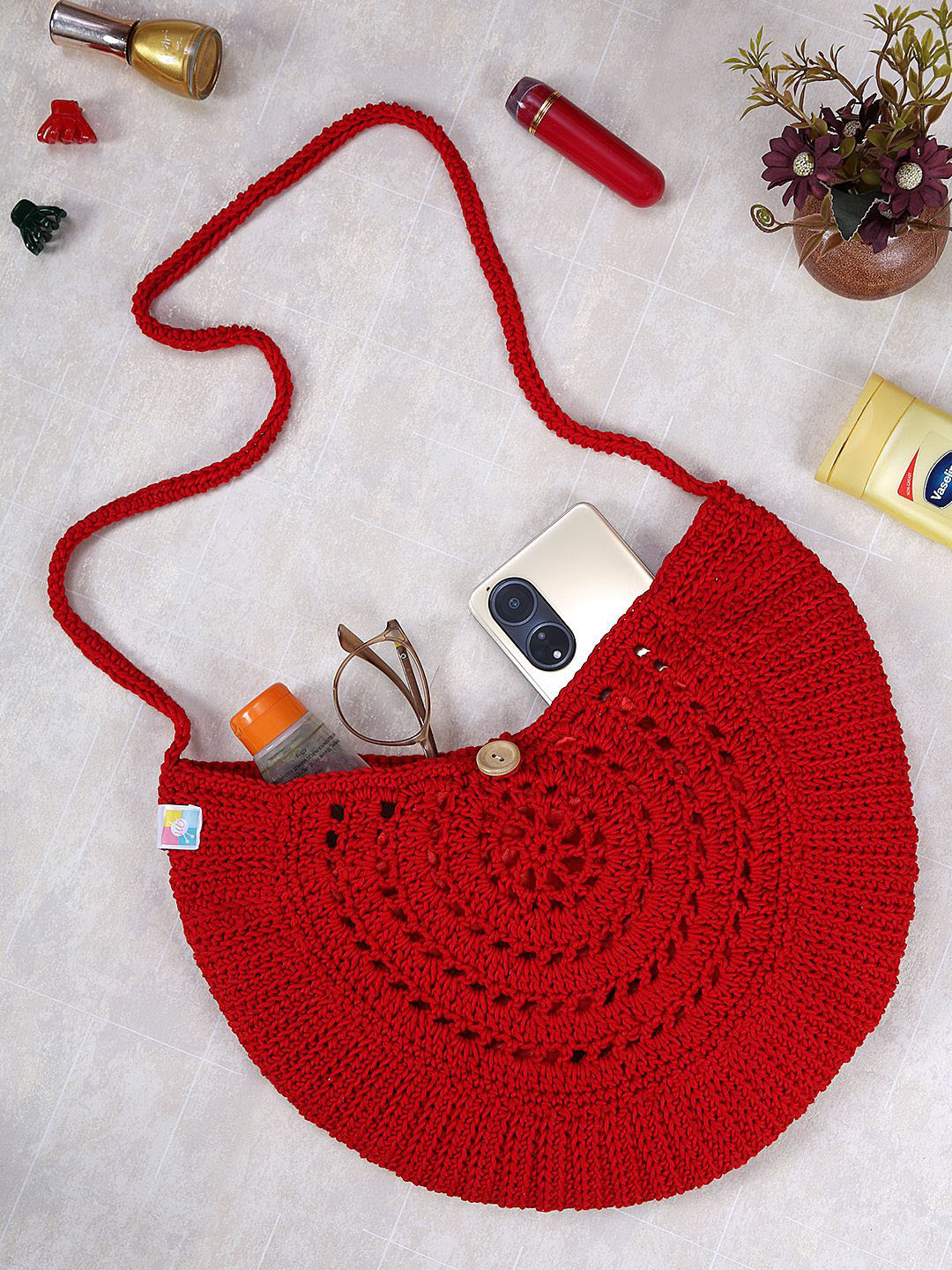 

Magic Needles Cherry Red Half Moon Sling Bag