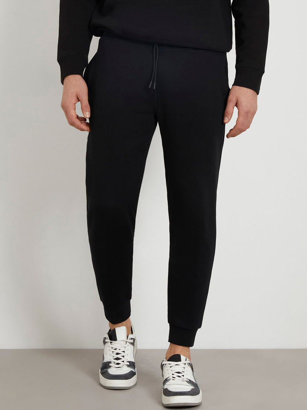 

GUESS Men Mid-Rise Regular Fit Joggers Trousers, Black