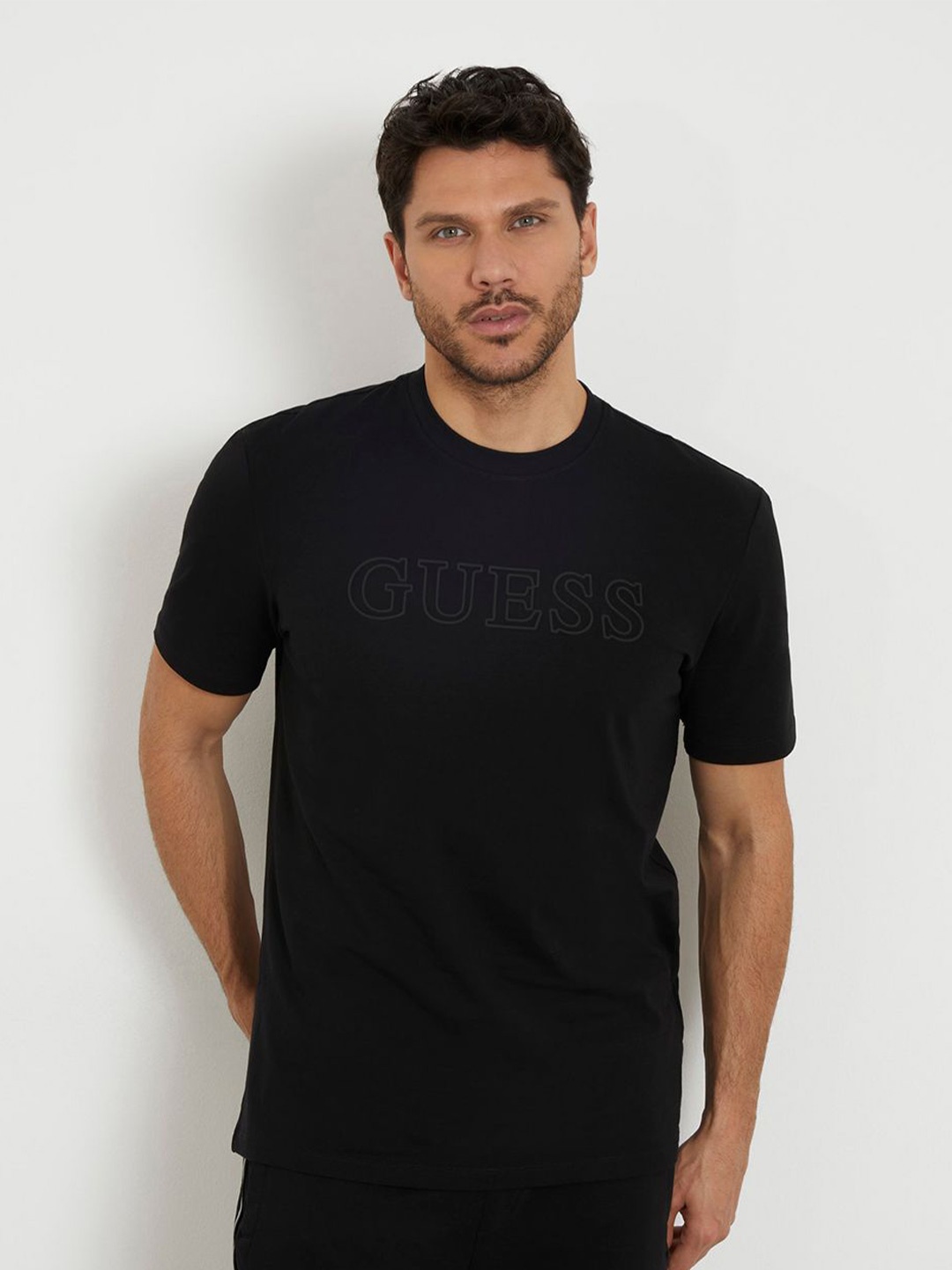 

GUESS Men Solid Printed Round Neck T-shirt, Black