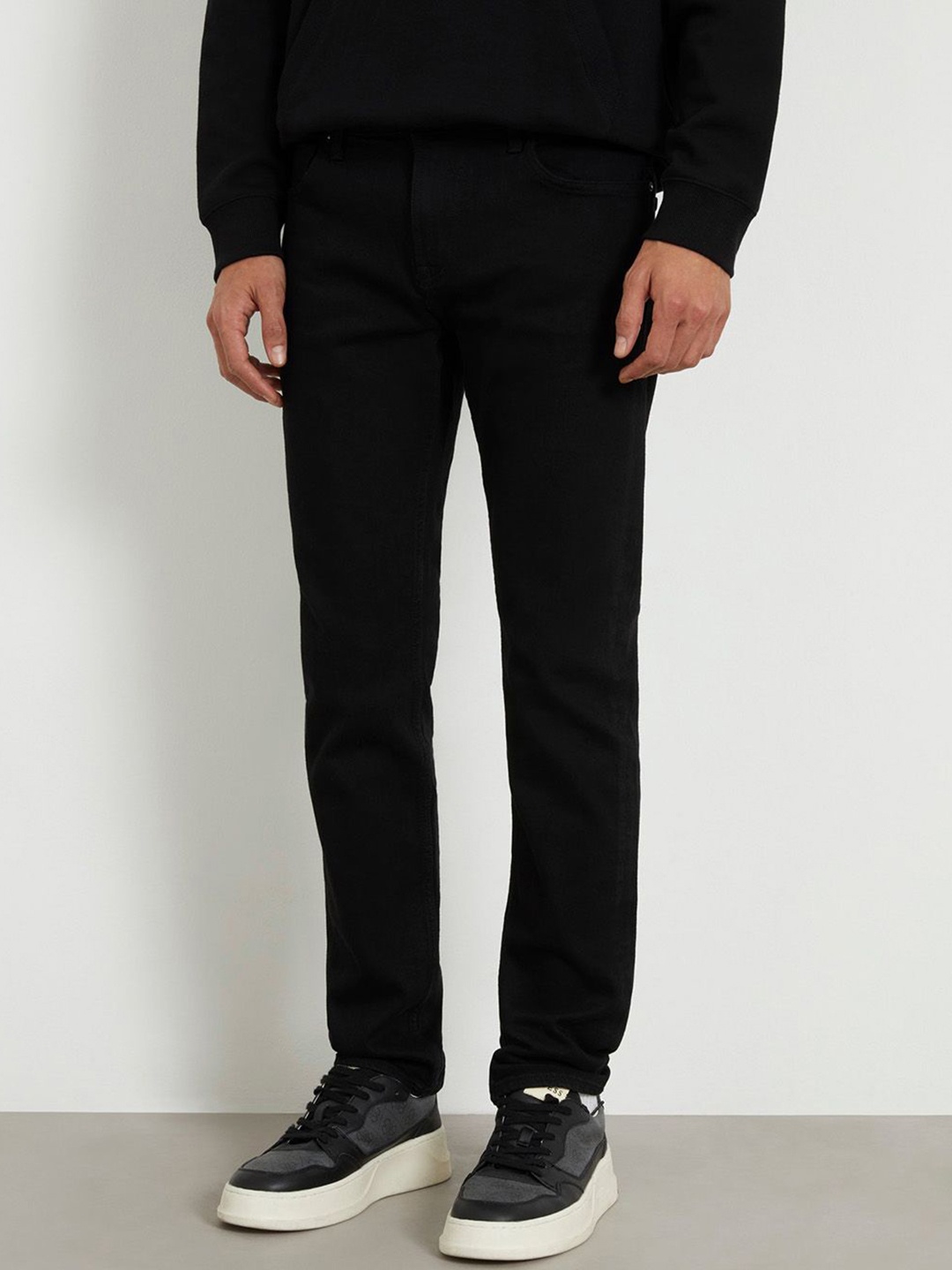 

GUESS Men Slim Fit Mid-Rise Clean Look Cotton Jeans, Black