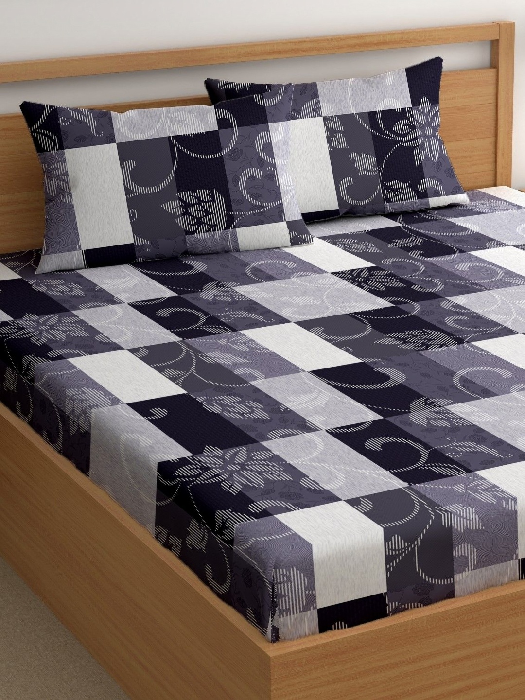 

CHHAVI INDIA Navy Blue & Grey Floral 210 TC King Bedsheet with 2 Pillow Covers