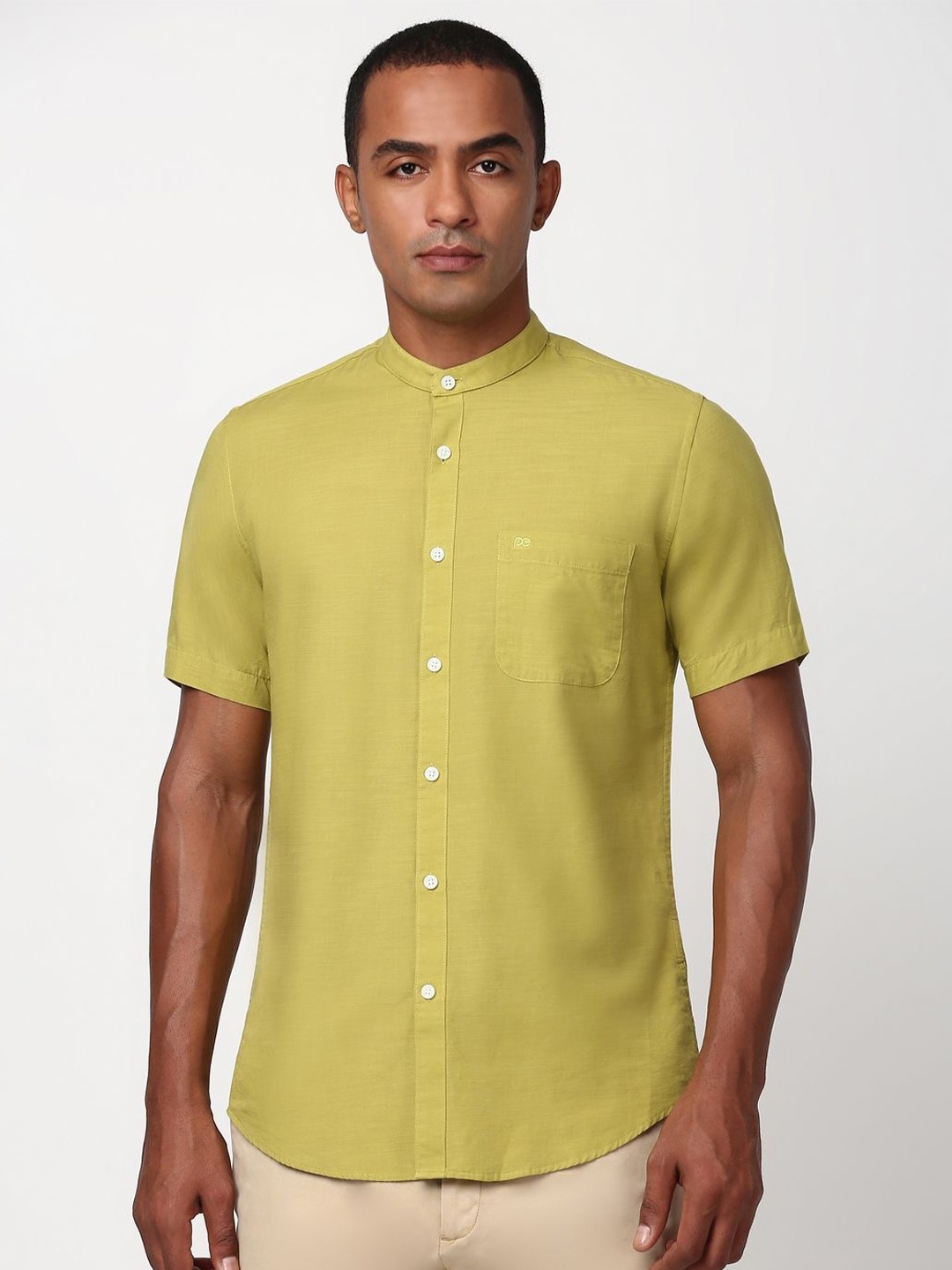 

Peter England Casuals Men Solid Mandarin Collar Shirt, Yellow