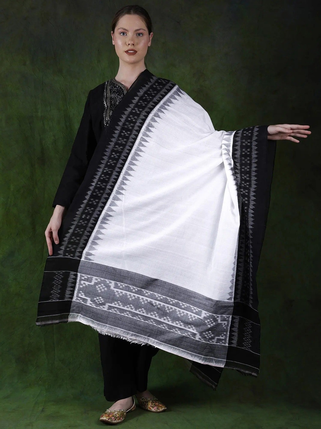 

Exotic India White-Black Pure Cotton Handloom Ikat Pochampally Dupatta with Temple Border