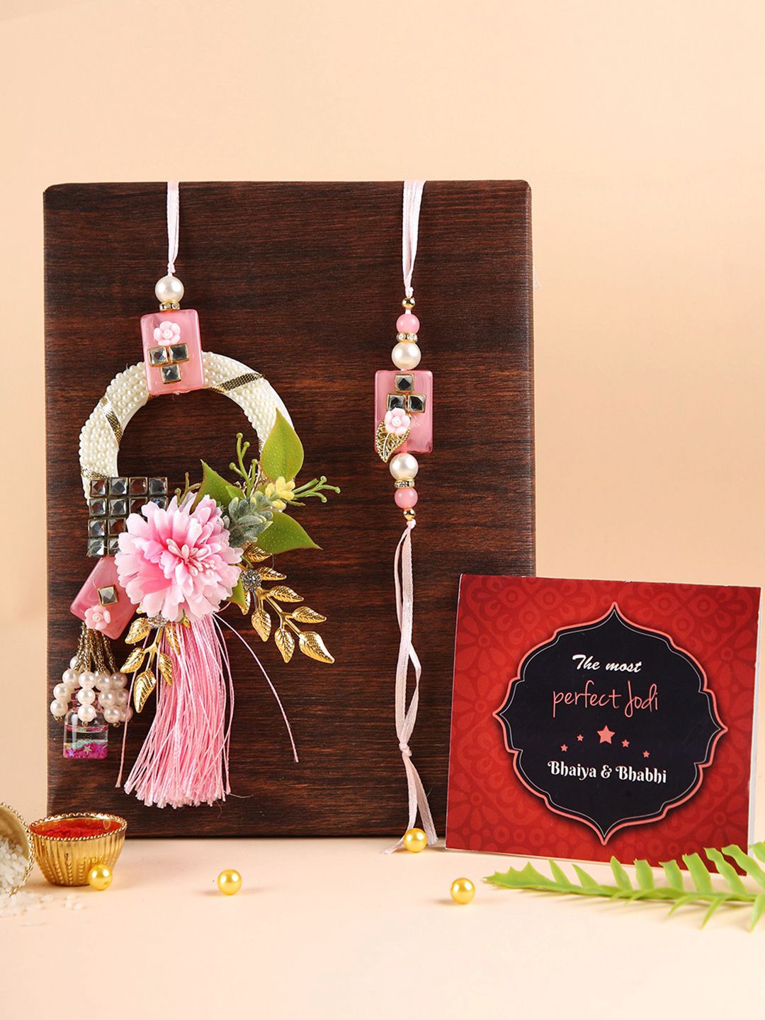 

TIED RIBBONS Set of 2 Floral Bhaiya Bhabhi Rakhi, Greeting Card and Tikka Combo, Pink