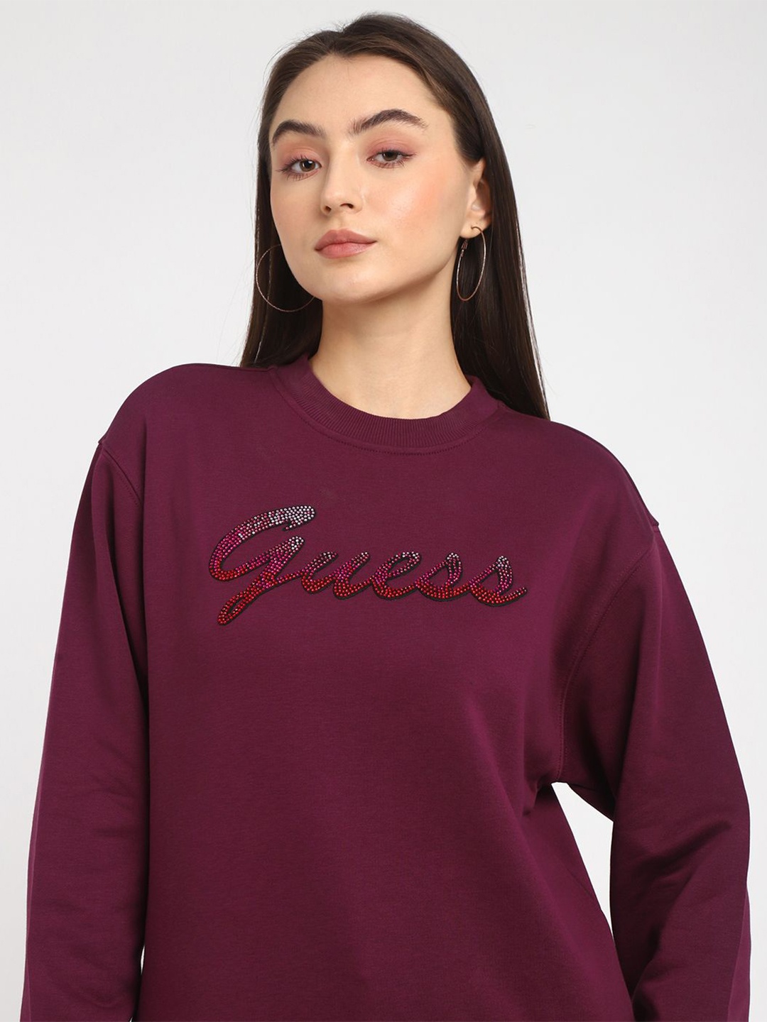 

GUESS Women Solid Embellished Round Neck Sweatshirt, Red