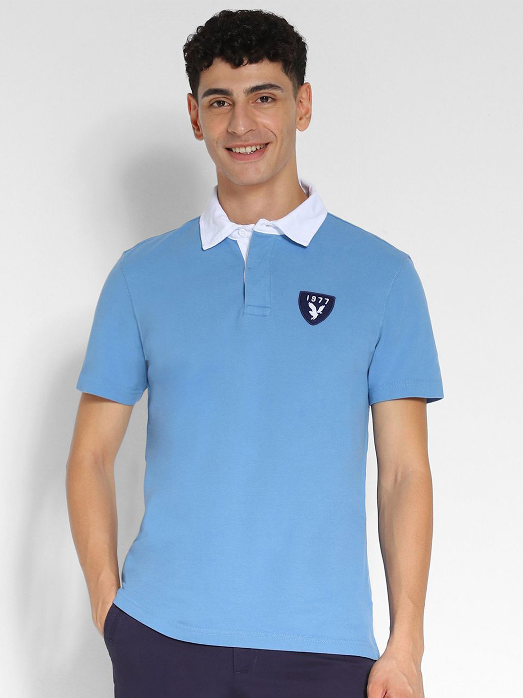 

AMERICAN EAGLE OUTFITTERS Men Solid Polo Collar Applique T-shirt, Blue
