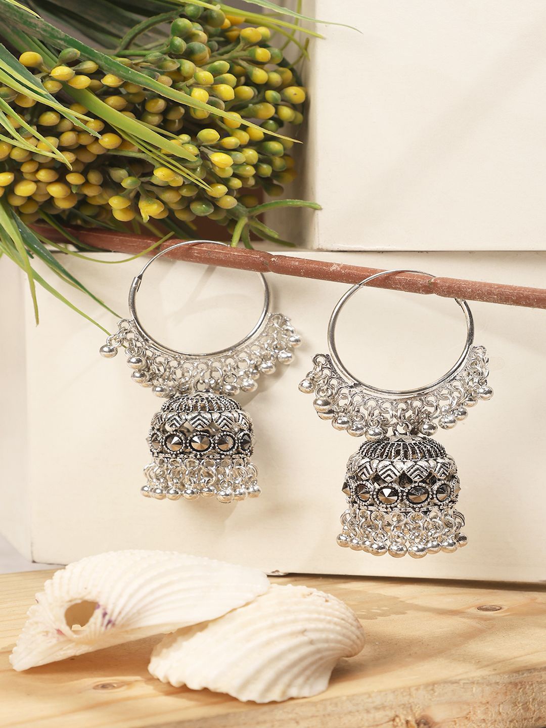 

ANIKAS CREATION German Silver Silver-Plated Contemporary Jhumkas