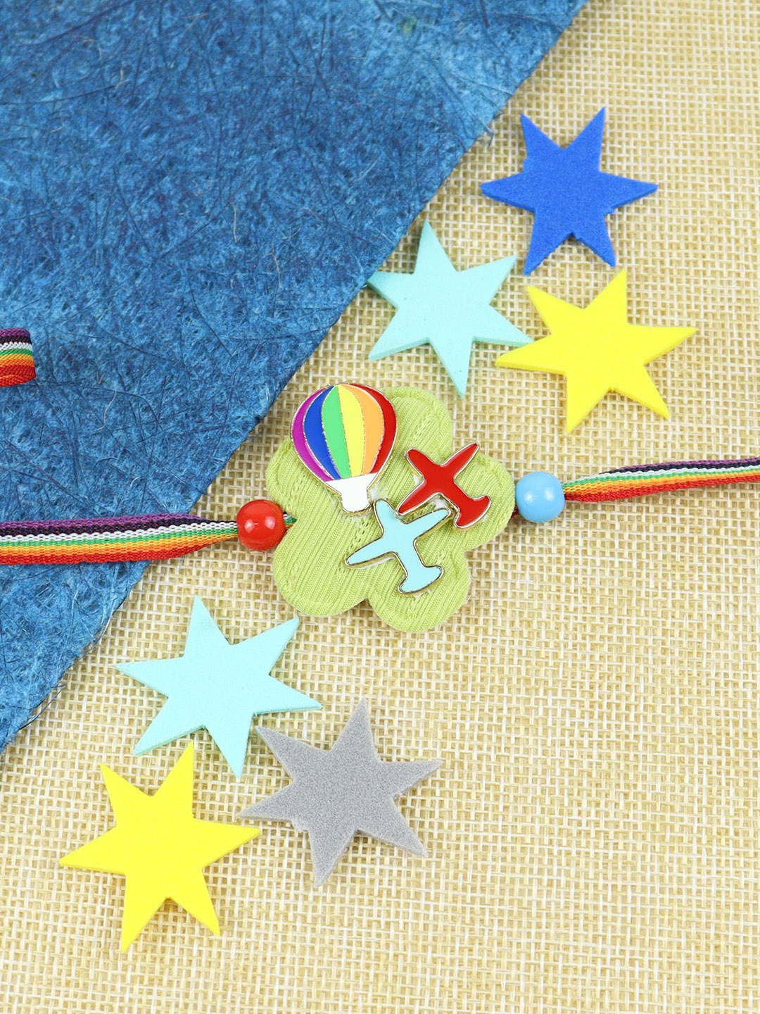 

Asthetika Boys Airplane Parachute Thread Rakhi with Roli Chawal, Yellow