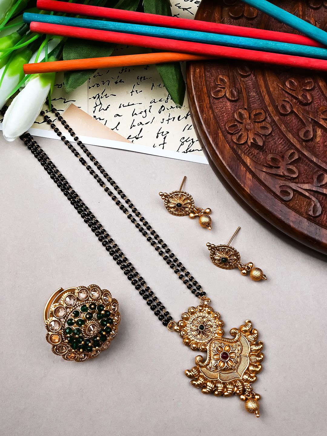 

StileAdda Gold Plated Artificial Stones and Beads Mangalsutra with Earrings & Ring