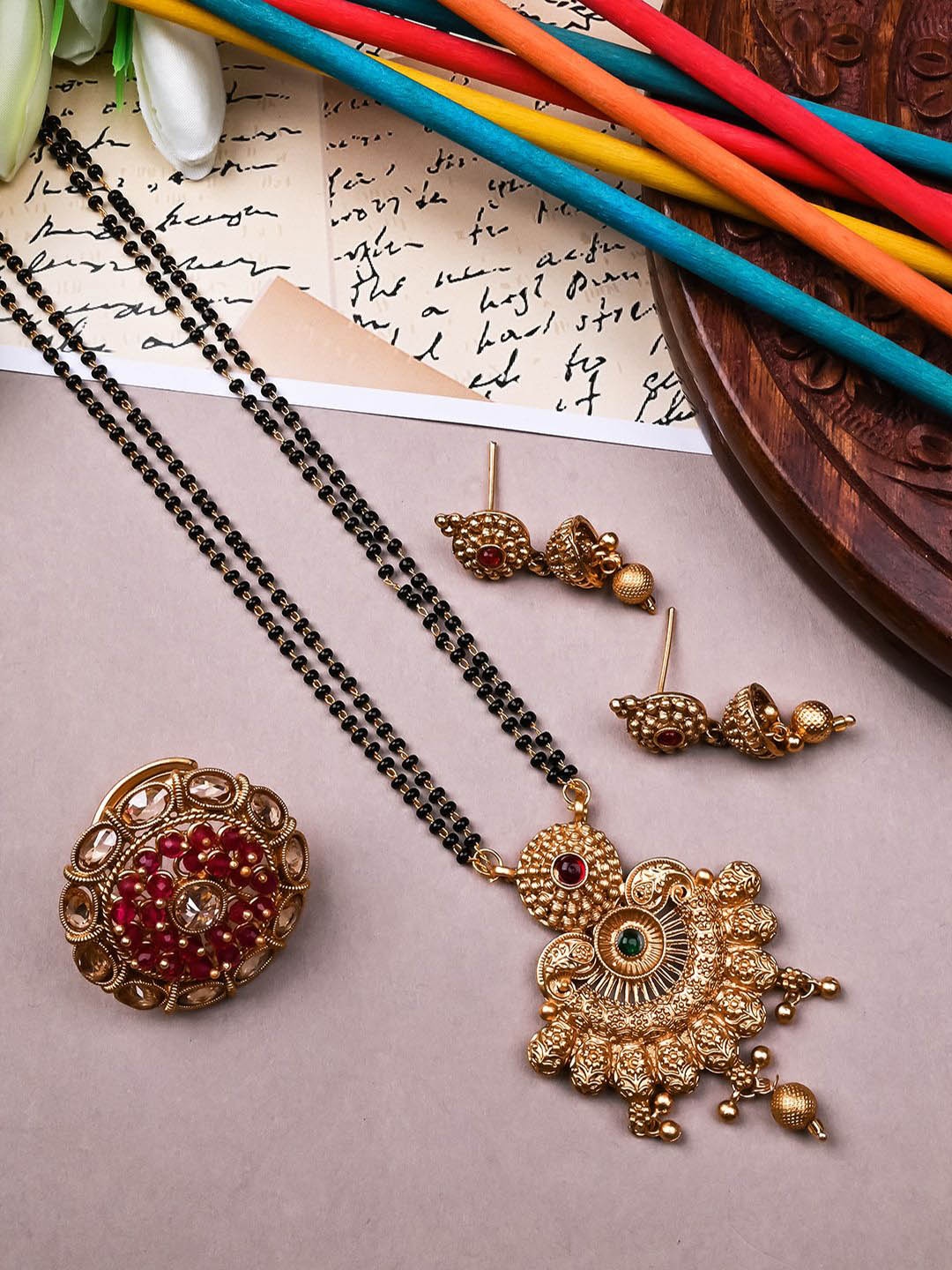 

StileAdda Gold-Plated Artificial Stones and Beads Mangalsutra With Earrings & Ring