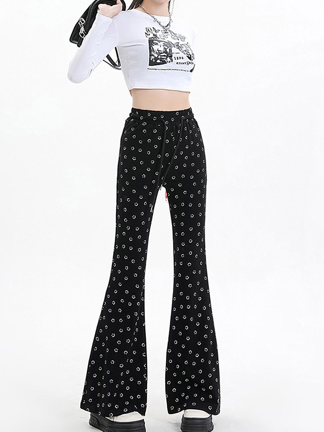 

LULU & SKY Women Polka Dot Printed Flared High-Rise Trousers, Black