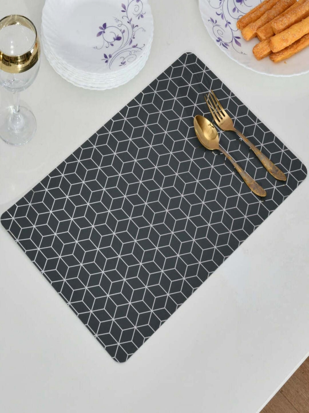 

Athome by Nilkamal Set Of 4 Geometric Printed Rectangular Table Placemats, Black