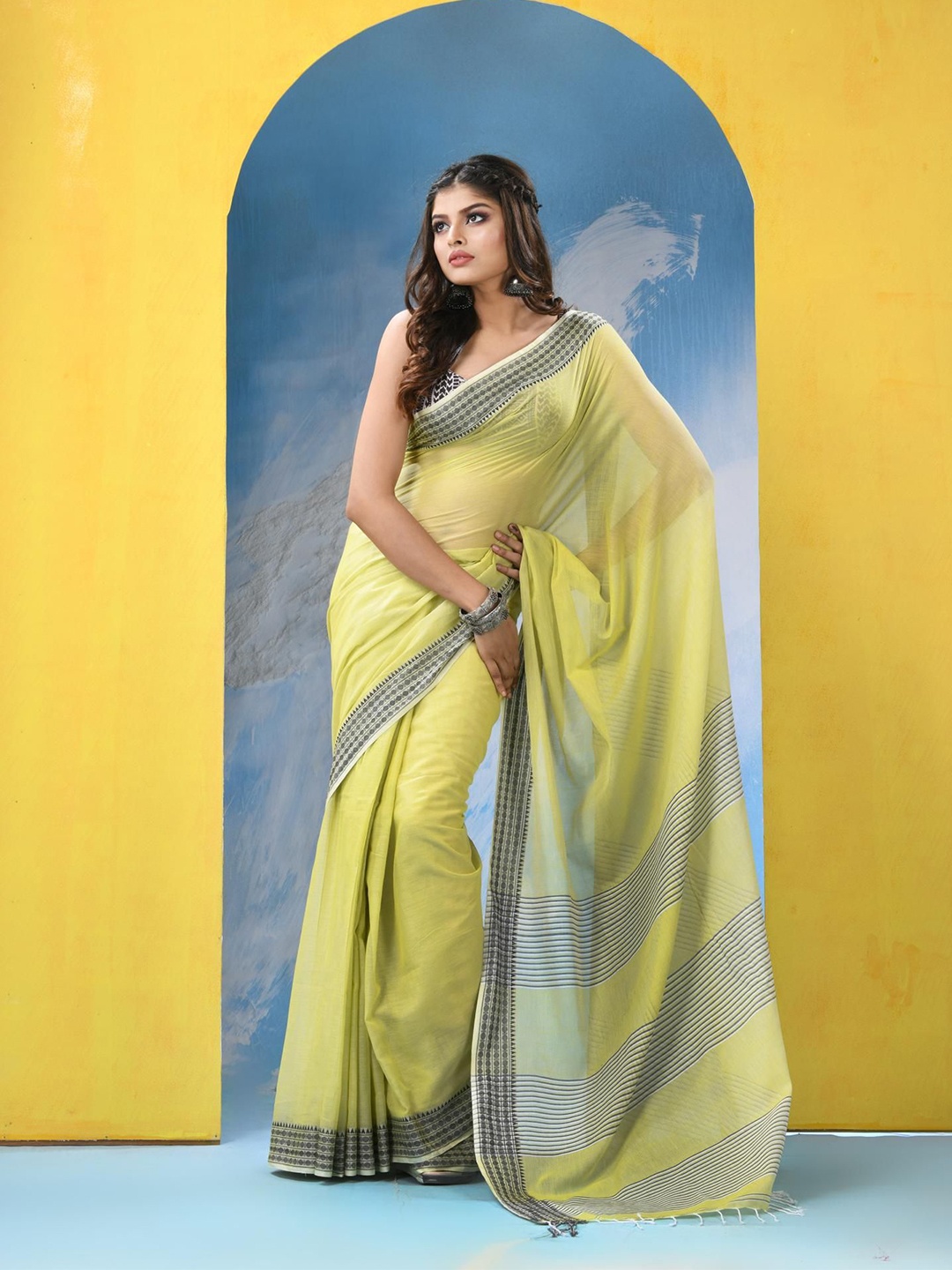 

Angoshobha Sequinned Pure Cotton Saree, Yellow