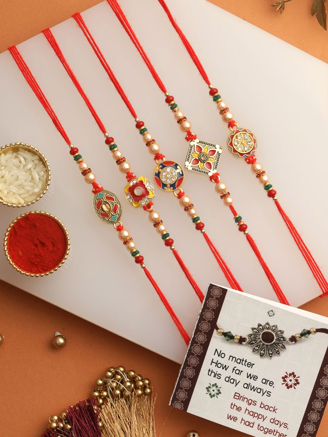 

TIED RIBBONS Set of 5 Designer Rakhi Combo with Card & Roli Chawal, Gold