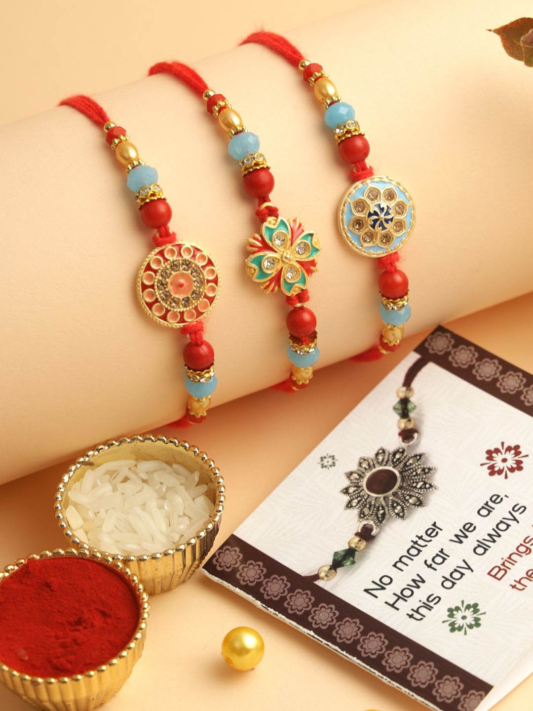 

TIED RIBBONS Set of 3 Premium Kundan Rakhi with Card & Roli Chawal, Red