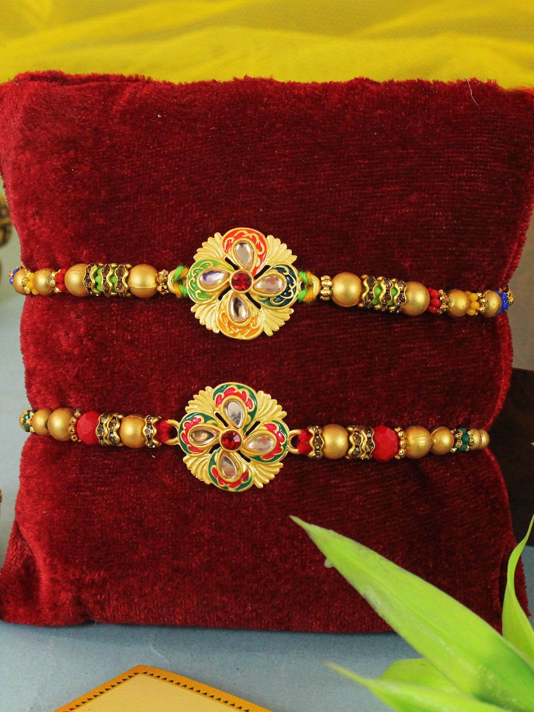 

TIED RIBBONS Set of 2 Designer Pearl Rakhi with Card & Roli Chawal, Red