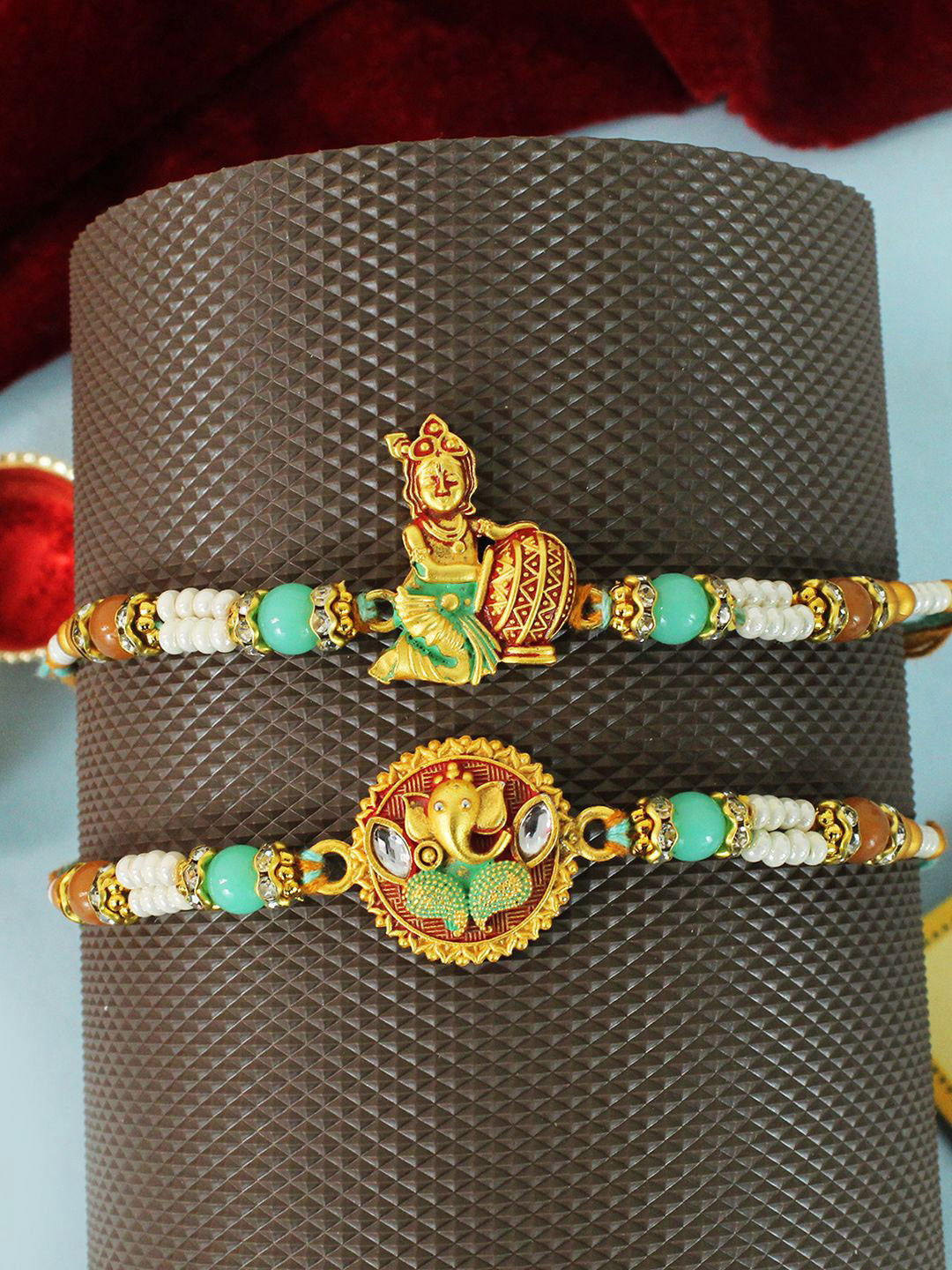 

TIED RIBBONS Set of 2 Krishna Ganesh Rakhi with Card & Roli Chawal Pack, Gold