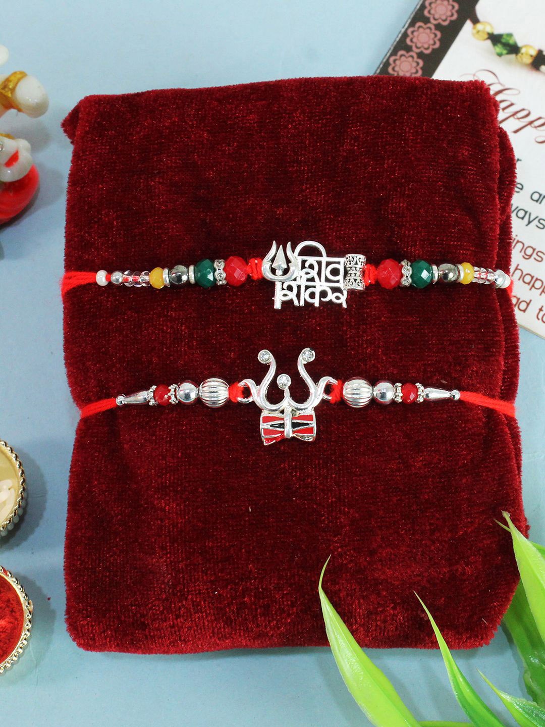 

TIED RIBBONS Set of 2 Premium Silver Rakhi with Card & Roli Chawal Combo, Red