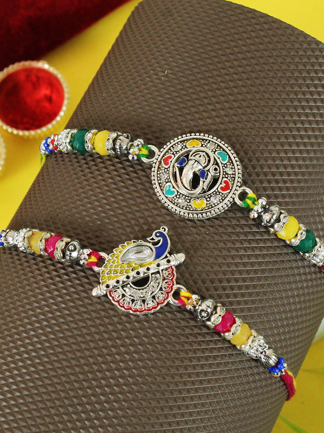 

TIED RIBBONS Set of 2 Silver Rakhi with Card & Roli Chawal Pack