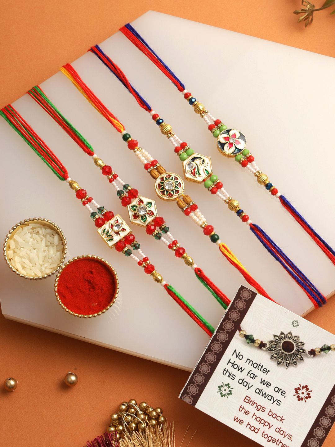 

TIED RIBBONS Set of 5 Premium Kundan Rakhi Combo with Card & Roli Chawal, Red