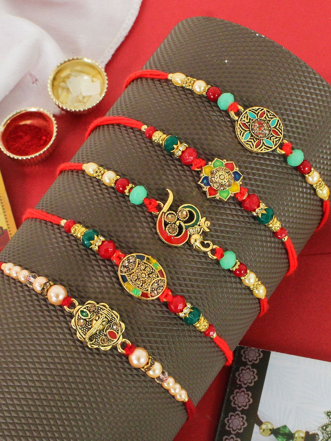 

TIED RIBBONS Set of 5 Premium Rakhi Combo with Card & Roli Chawal, Gold