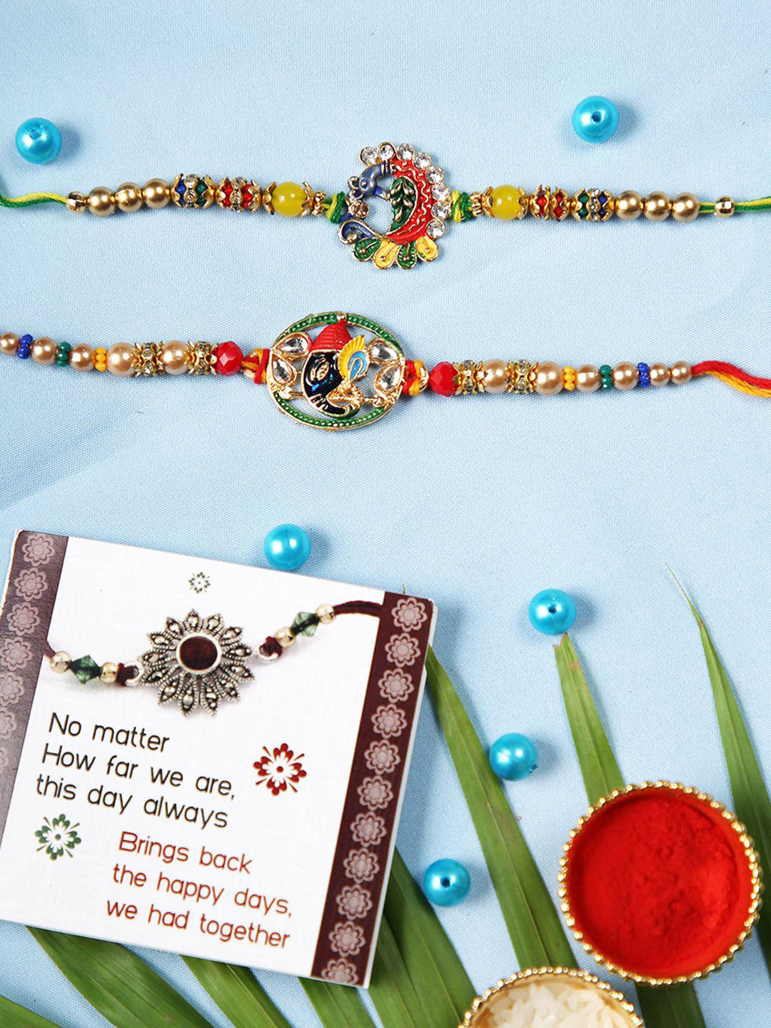 

TIED RIBBONS Set of 2 Designer Rakhi with Greeting Card & Roli Chawal, Red