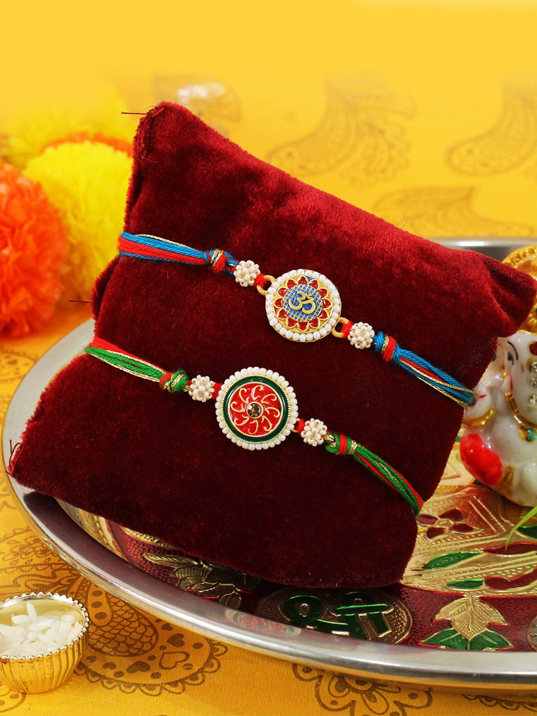 

TIED RIBBONS Set of 2 Premium Rakhis with Greeting Card & Roli Chawal, Red