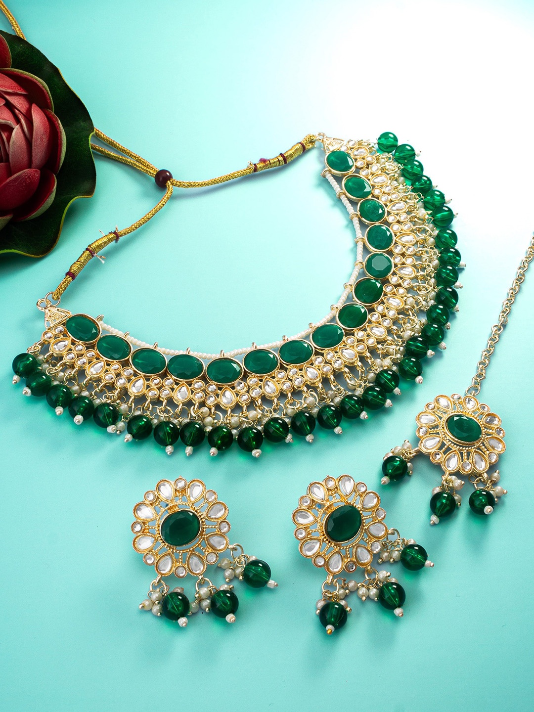 

aadita Gold-Plated Stone-Studded & Beaded Jewellery Set