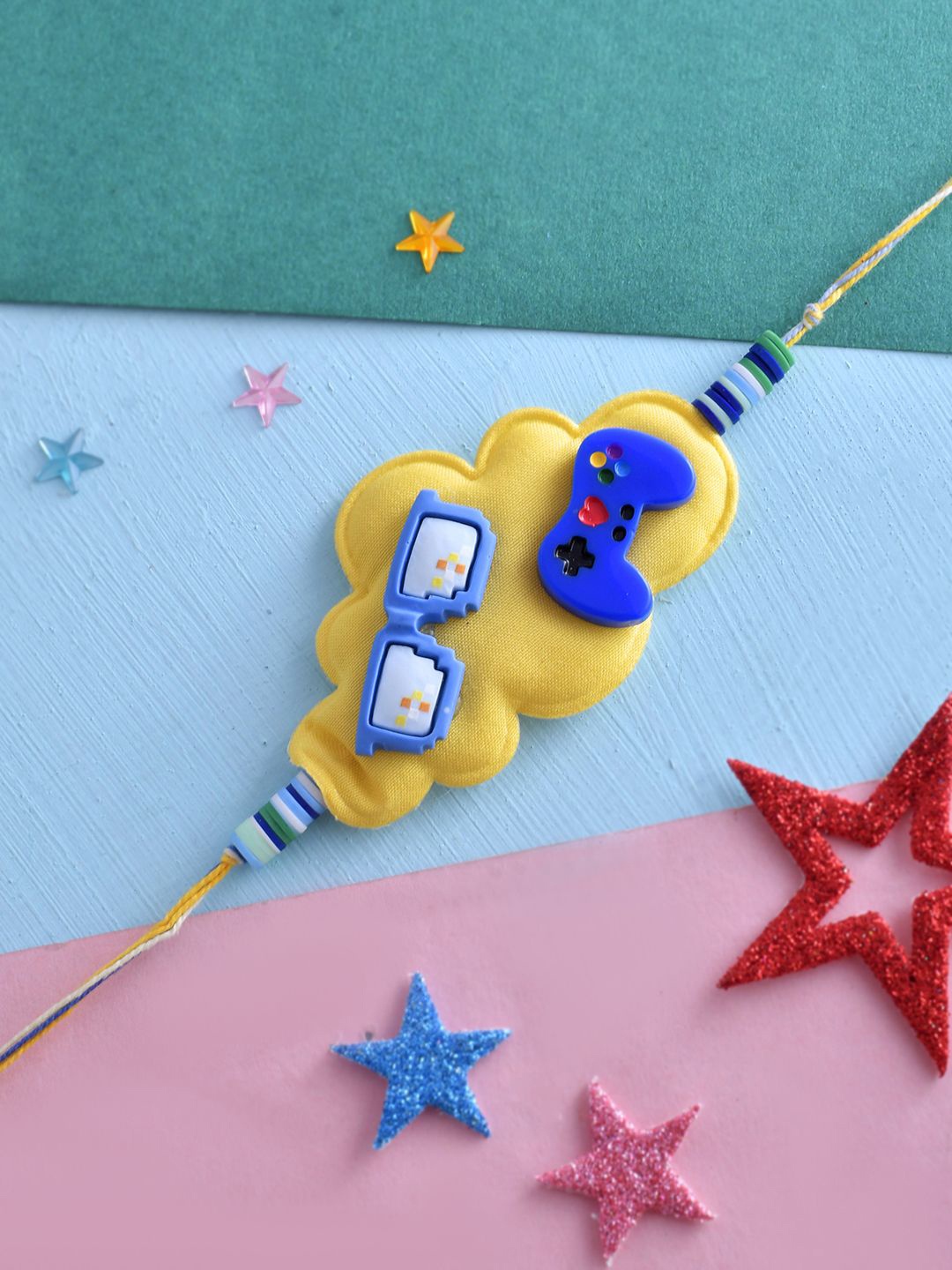

Voylla Kids Glasses And Controller Thread Rakhi, Yellow
