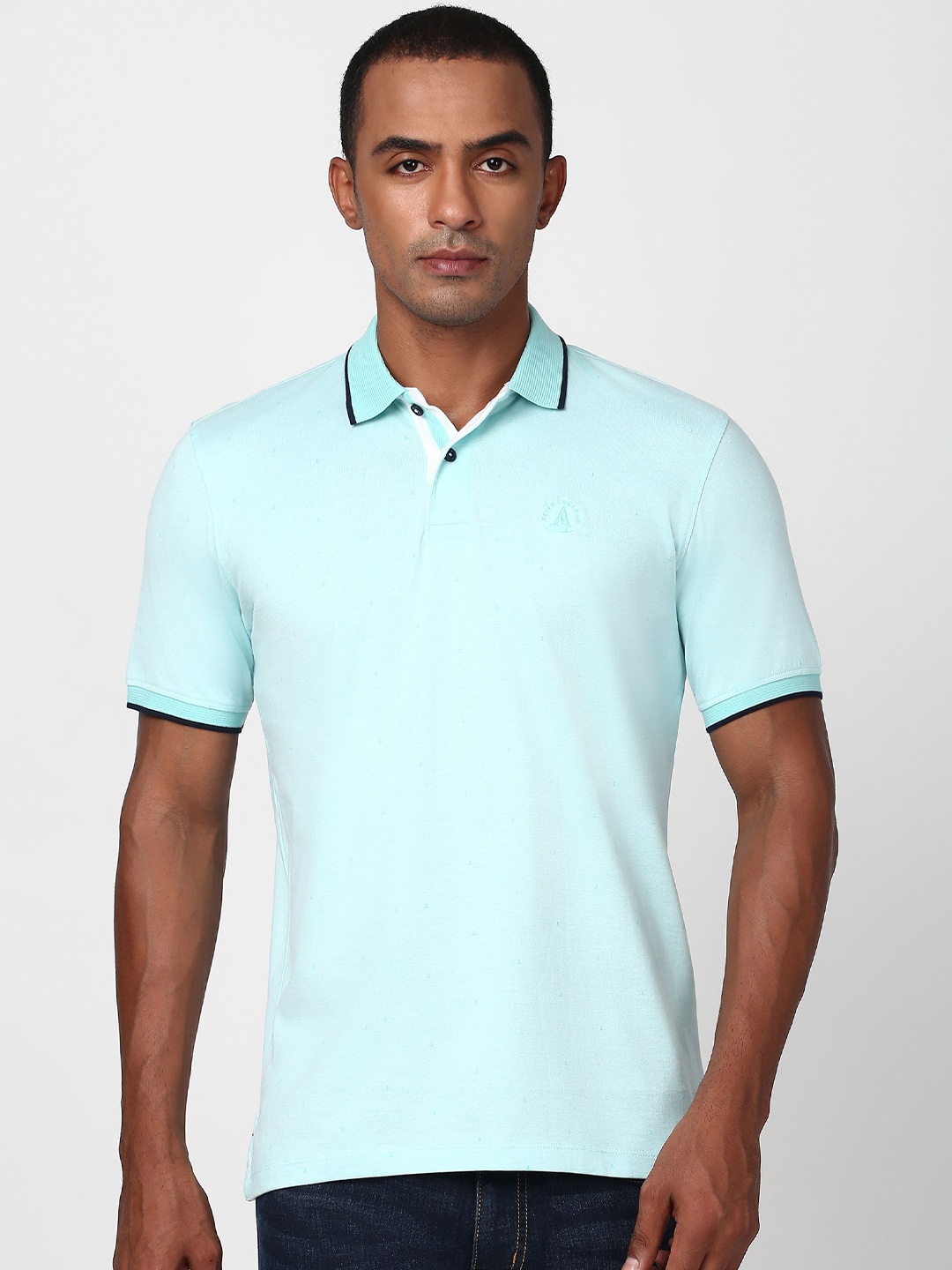 

Peter England Casuals Men Solid Polo Collar T-shirt, Blue
