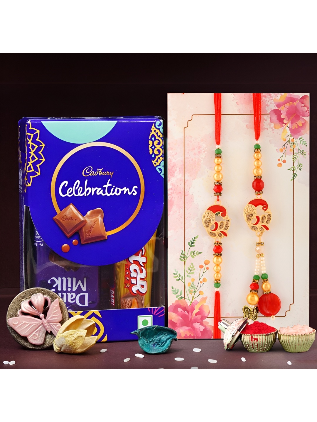 

Ascension Set Of 2 Bhaiya Bhabhi Rakhis With Celebration Pack & Rholi Chawal, Blue