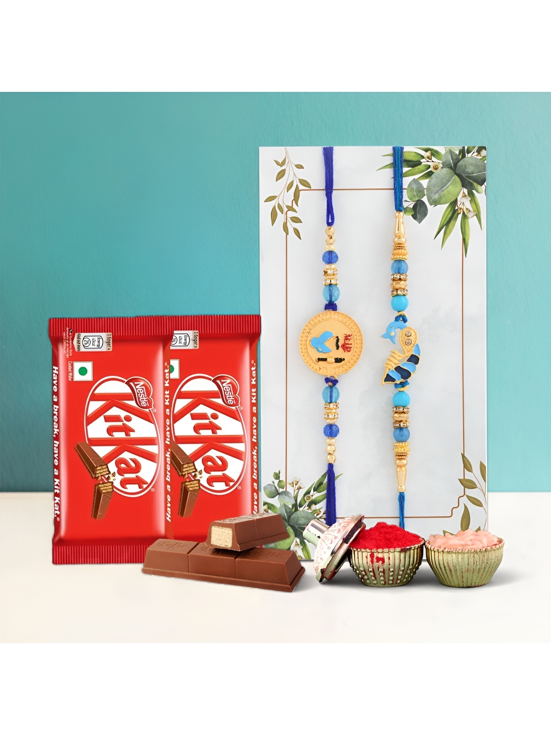 

Ascension Set of 2 Beaded Rakhi With Kitkat Chocolates & Greeting Card With Roli Chawal, Blue