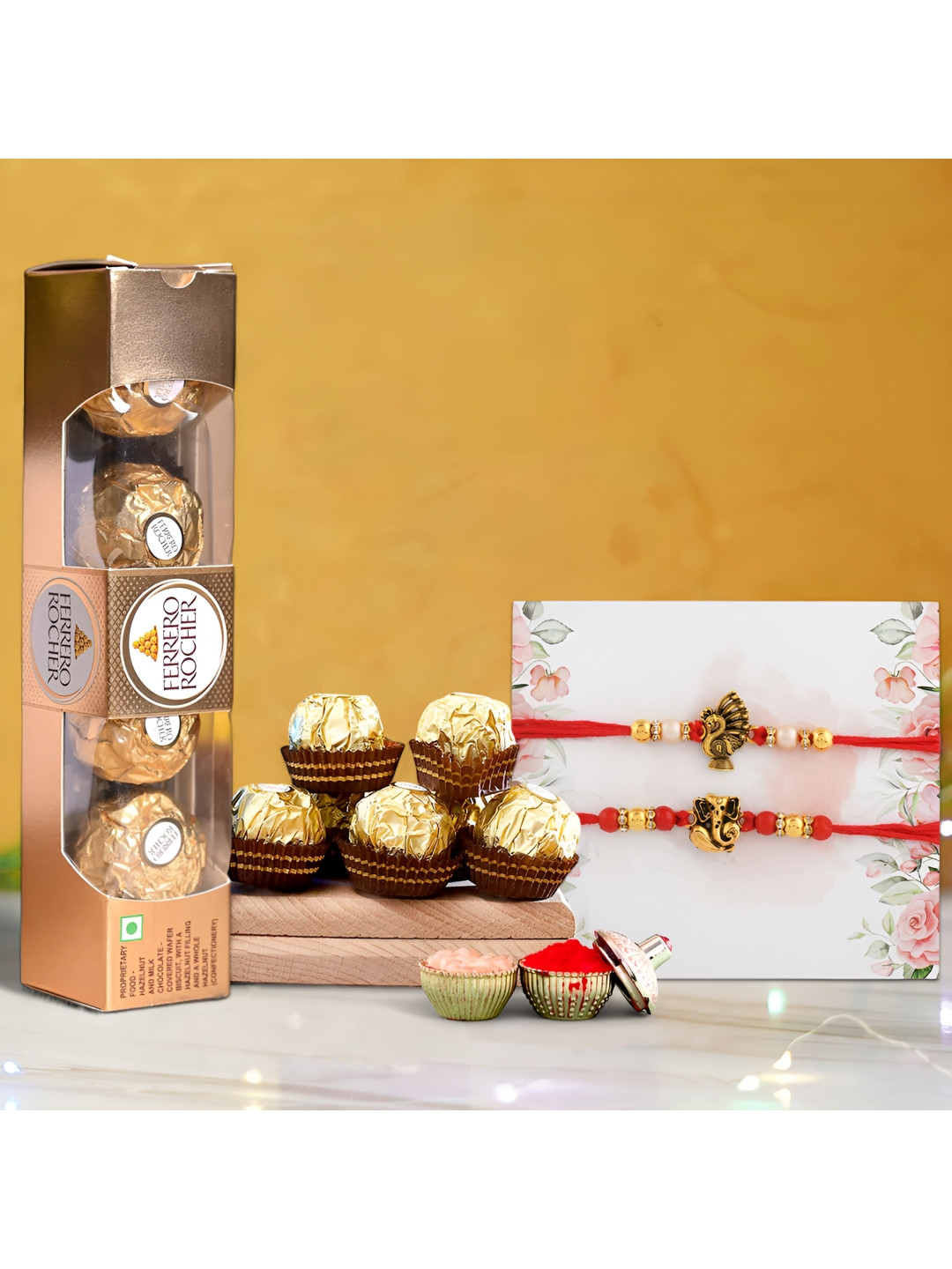

Ascension Set Of 2 Bhaiya Bhabhi Rakhis With Ferrero Rocher Chocolates With Rholi Chawal, White
