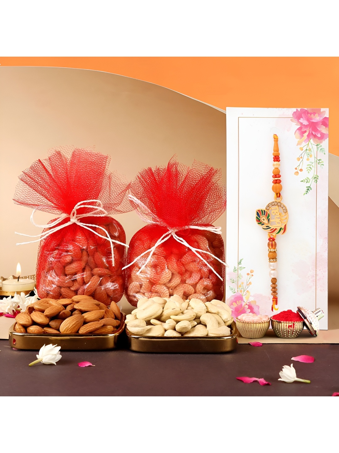 

Ascension Rakhi With Mix Dry Fruits & Roli Tilak, Red